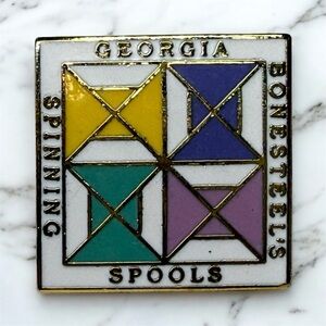 Georgia Bonesteel's Spinning Spools Enamel Pin - Quilting
Collectible